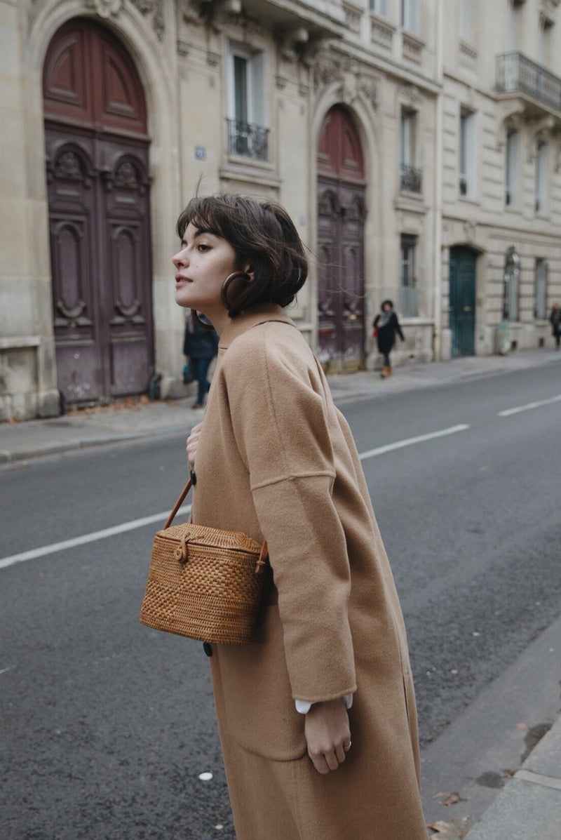 Woman crossing European street wearing Bembien Marfa Bag