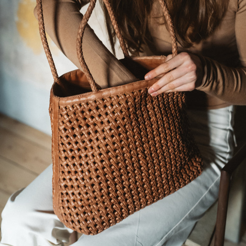 Bembien Olivia Tote in Sienna being looked into by a person